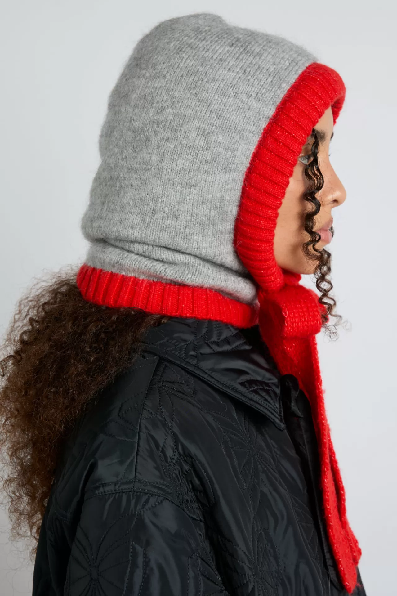 Shop Damson Madder hood in marl with red tie in premium yarn grey